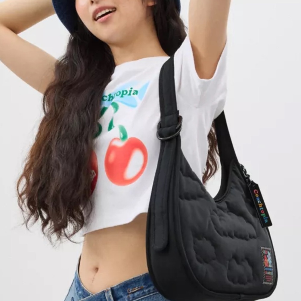 Black Coach Shoulder Bag with Quilted Design and Wide Strap